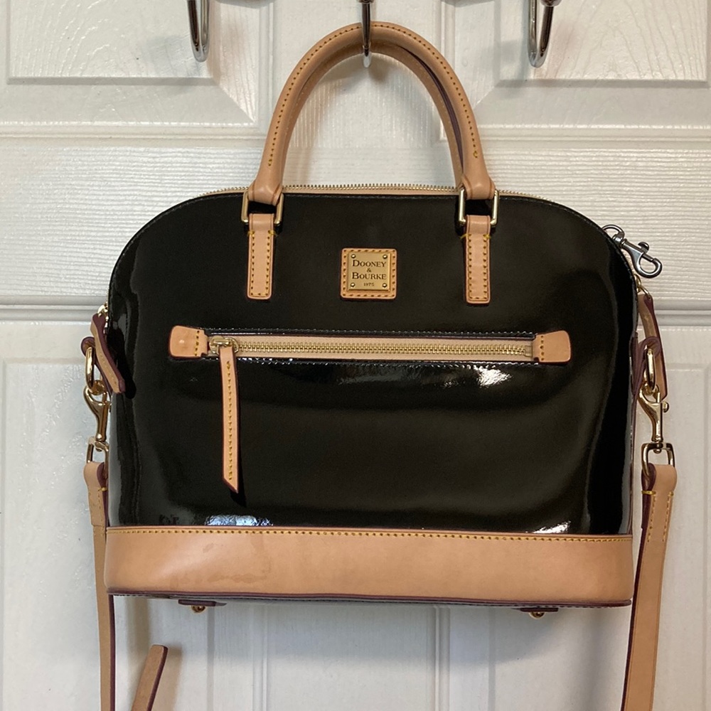 Dooney and Bourke black and tan pattern leather